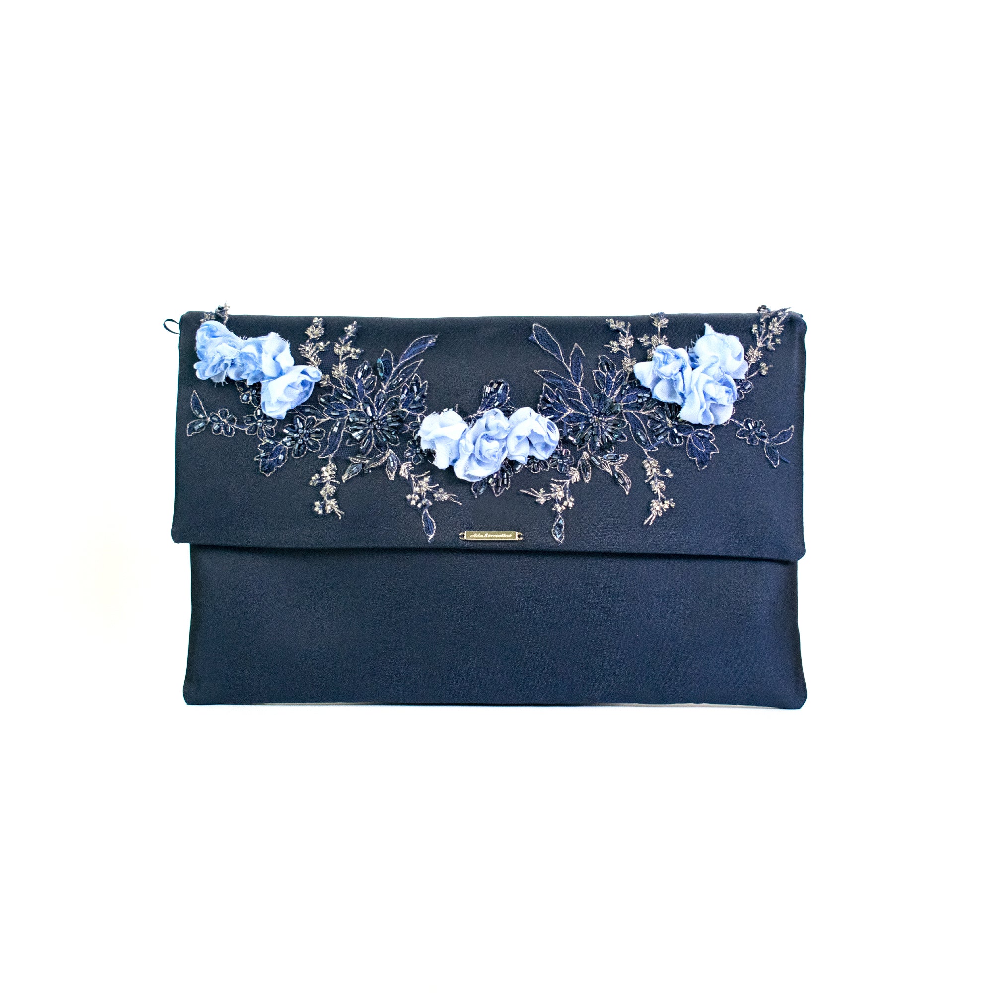 Blue clutch bag with three-dimensional flowers