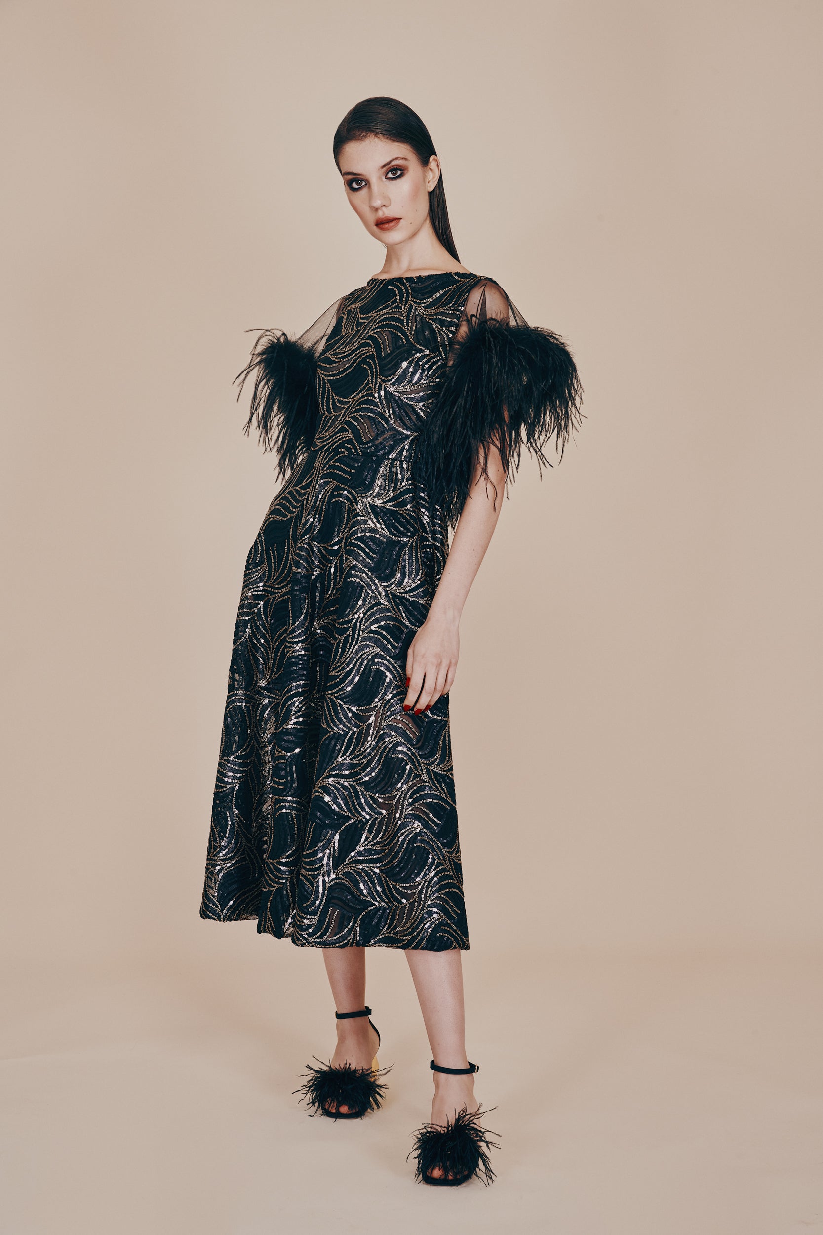 MIDI DRESS IN SEQUINS AND FEATHERS