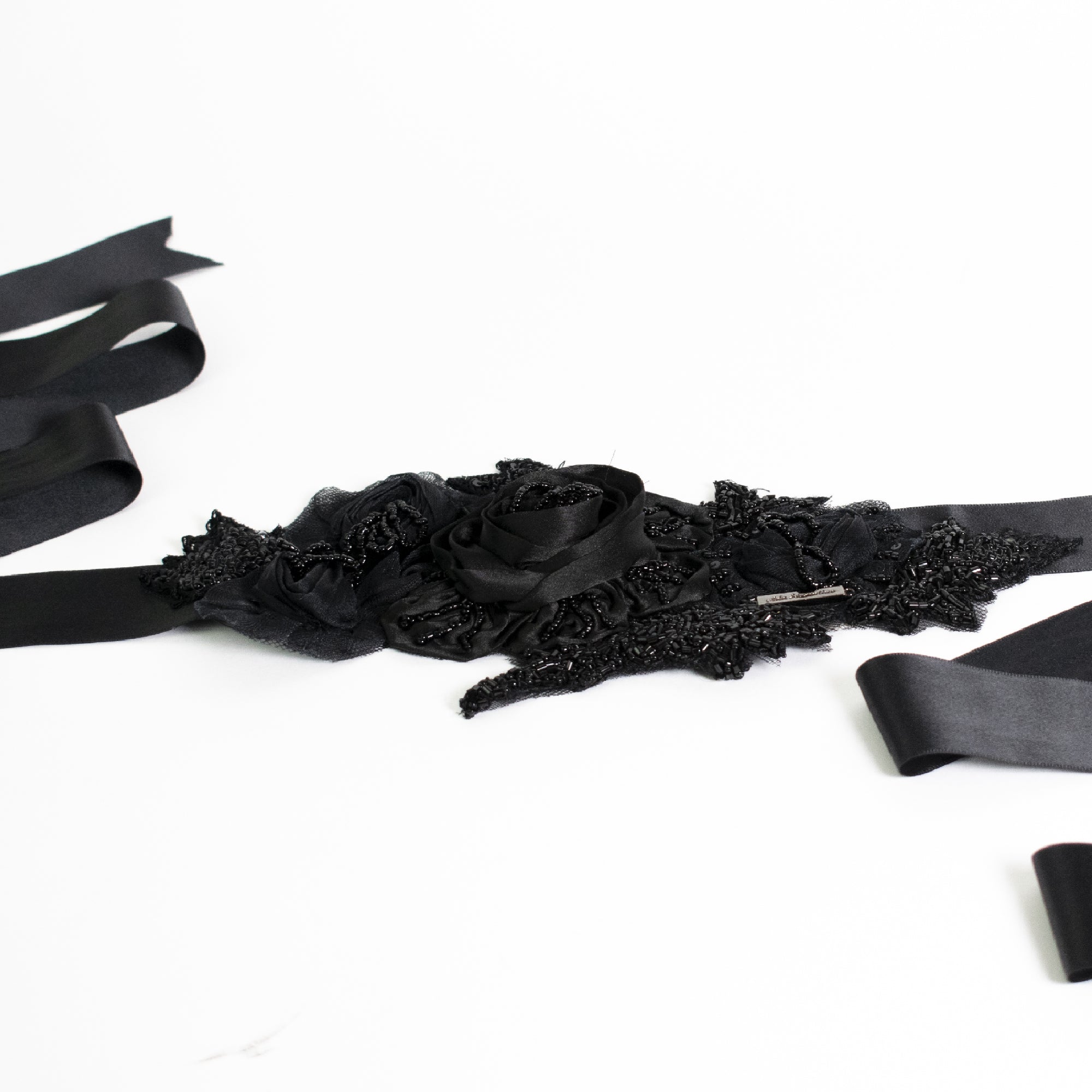 Black satin belt with three-dimensional flowers